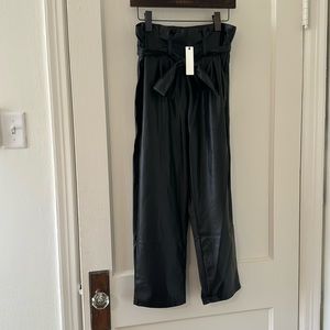 Belted, black faux leather pants